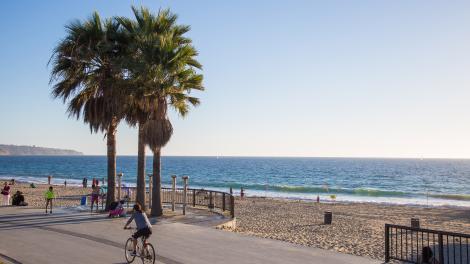 Biking beach-side along the Pacific Ocean.