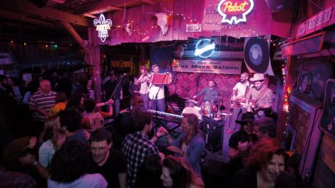 Dancing to a live band at the Blue Moon Saloon in Lafayette, Louisiana Dancing to a live band at the Blue Moon Saloon in Lafayette, Louisiana
