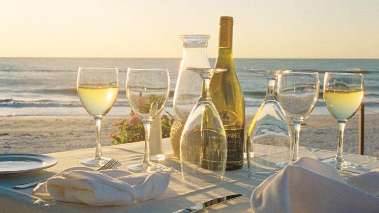 Waterfront dining is essential to savoring time in Naples.