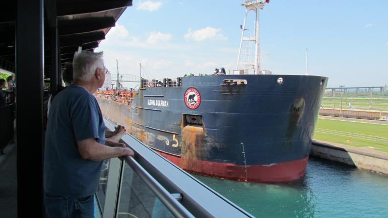 Boat tours allow visitors to get up close as giant freighters pass through the world-famous Soo Locks.