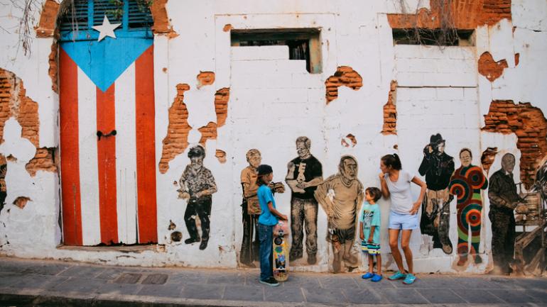 Posing with street art in Old San Juan