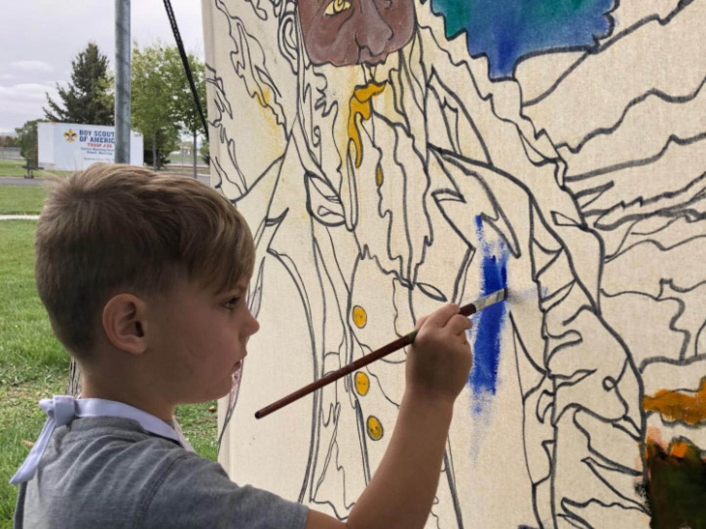 Diversión interactiva con pintura para niños en el John Wesley Powell Festival en Wyoming