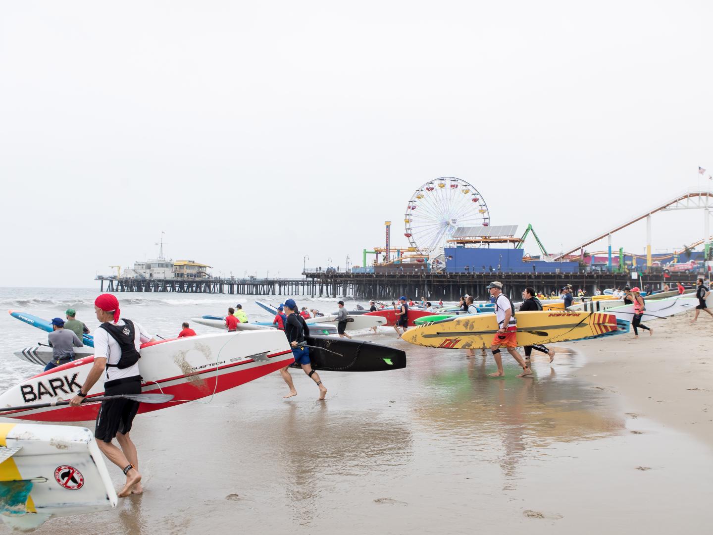 Start of the paddleboard race during Pier 360 in Santa Monica, California
