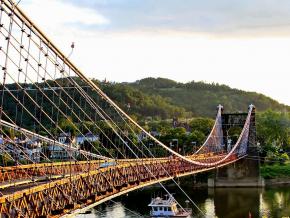 The historic Wheeling Suspension Bridge, built in 1849, over the Ohio River The historic Wheeling Suspension Bridge, built in 1849, over the Ohio River