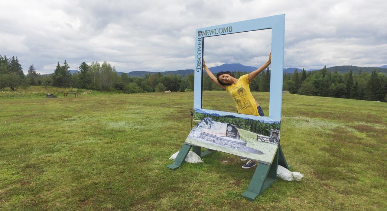 Posing with a roadside photo booth in Newcomb, New York