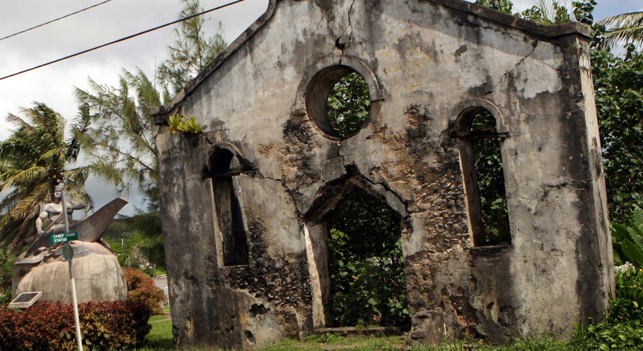 A historic church façade, mottled by time
