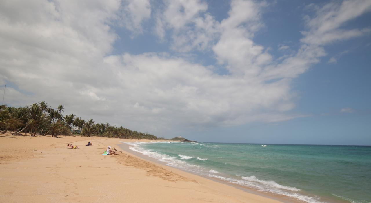 Relaxing on Poza del Obispo beach in Arecibo