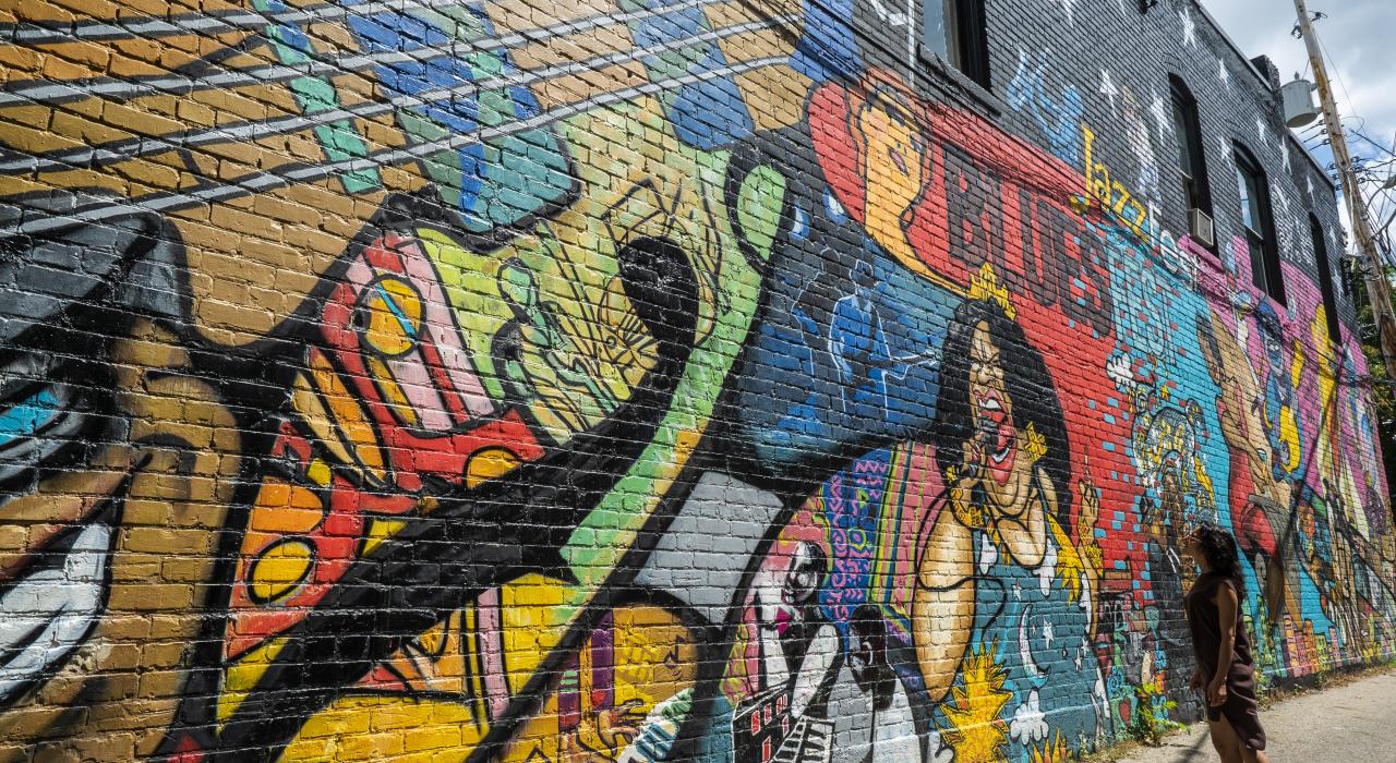 Viewing colorful murals in Old Town Lansing, Michigan