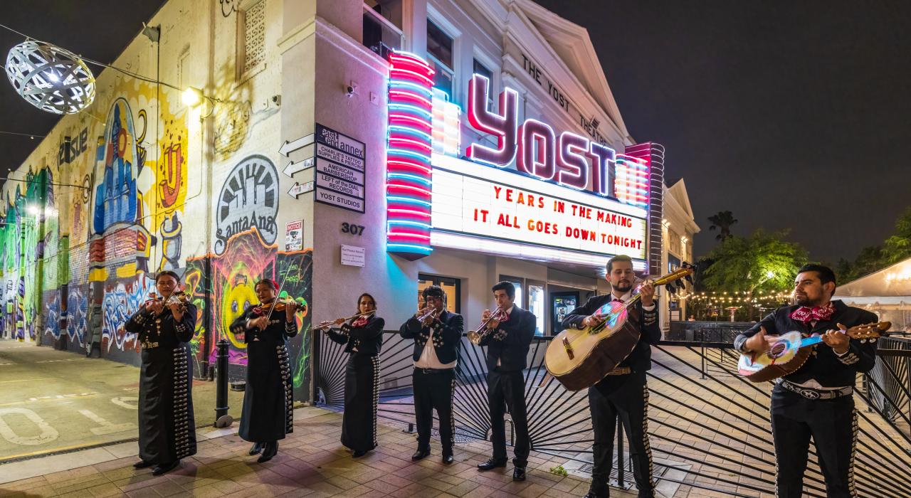 Mariachi band playing live music outside the Yost Theater