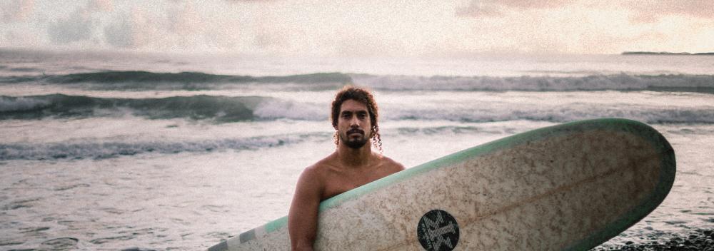 Cliff Kapono of Hilo, Hawaii, about to hit the waves